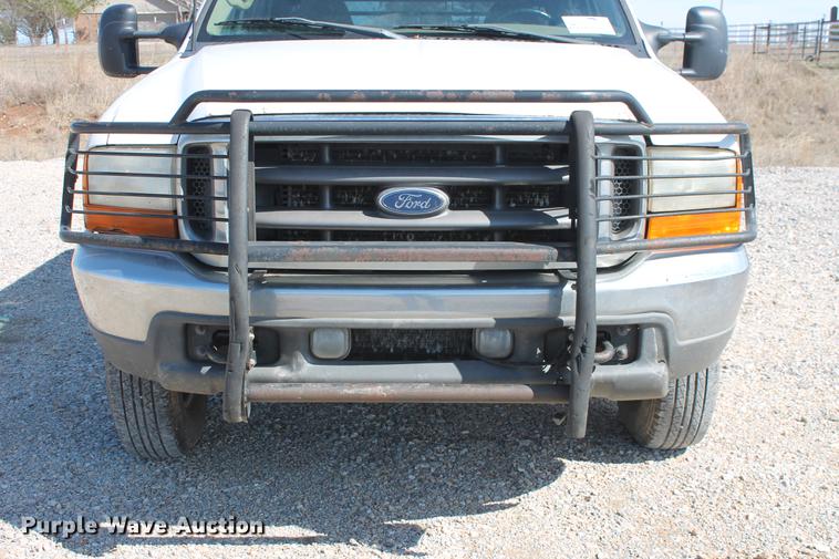 image for item DB5143 2001 Ford F350 Super Duty XL Crew Cab flatbed pickup truck