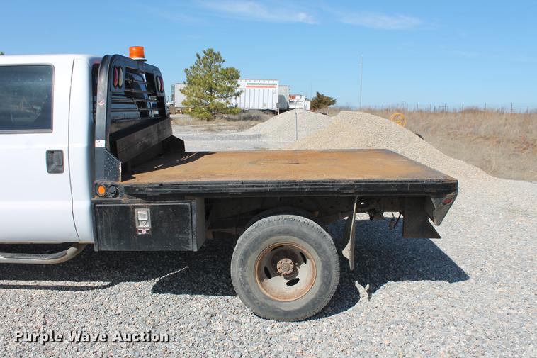 image for item DB5143 2001 Ford F350 Super Duty XL Crew Cab flatbed pickup truck