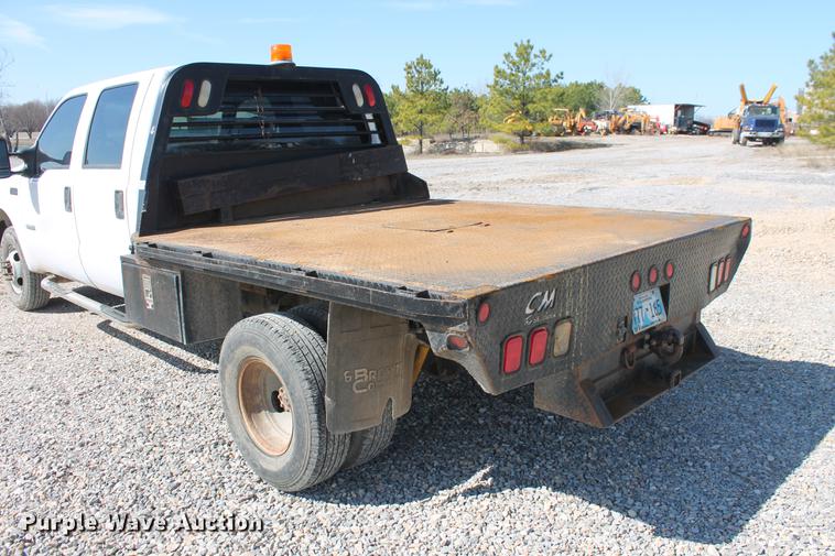 image for item DB5143 2001 Ford F350 Super Duty XL Crew Cab flatbed pickup truck