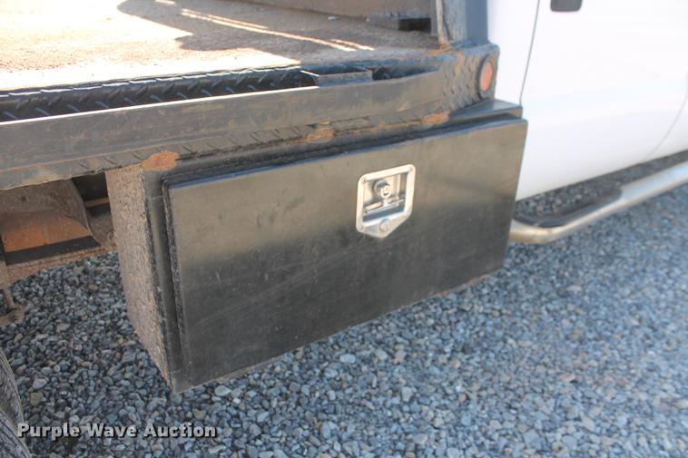 image for item DB5143 2001 Ford F350 Super Duty XL Crew Cab flatbed pickup truck