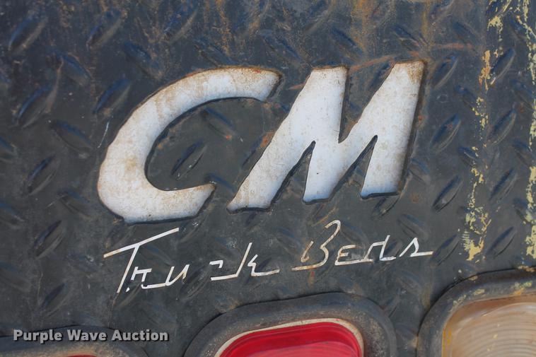 image for item DB5143 2001 Ford F350 Super Duty XL Crew Cab flatbed pickup truck