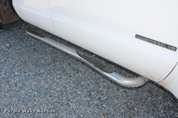 image for item DB5143 2001 Ford F350 Super Duty XL Crew Cab flatbed pickup truck