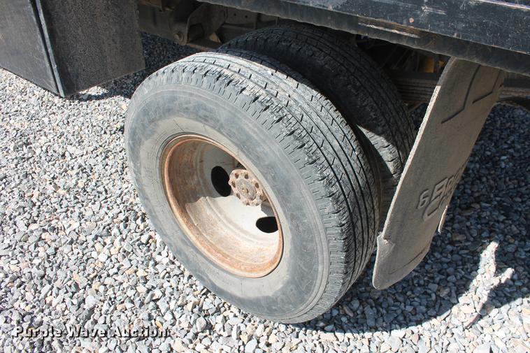 image for item DB5143 2001 Ford F350 Super Duty XL Crew Cab flatbed pickup truck