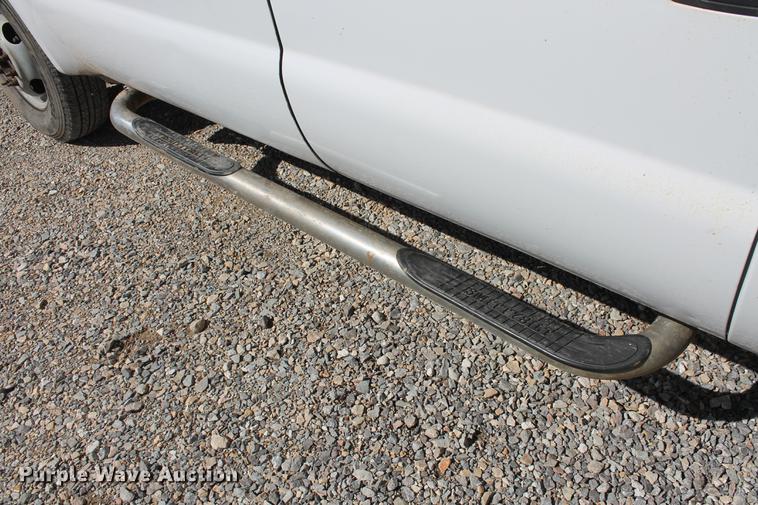 image for item DB5143 2001 Ford F350 Super Duty XL Crew Cab flatbed pickup truck