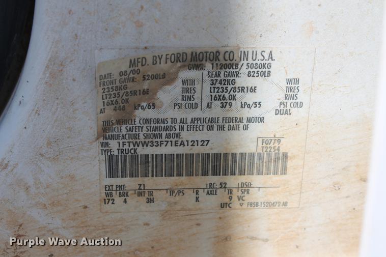 image for item DB5143 2001 Ford F350 Super Duty XL Crew Cab flatbed pickup truck