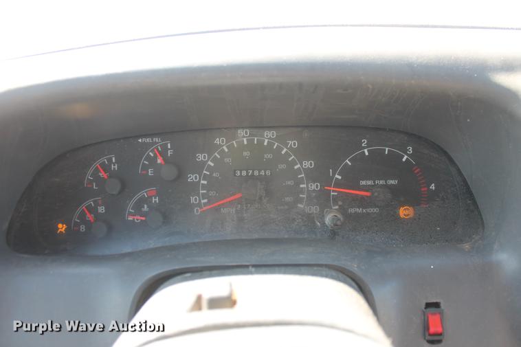 image for item DB5144 1999 Ford F350 Super Duty XLT SuperCab flatbed pickup truck