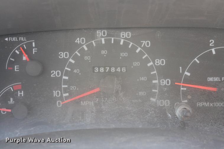 image for item DB5144 1999 Ford F350 Super Duty XLT SuperCab flatbed pickup truck