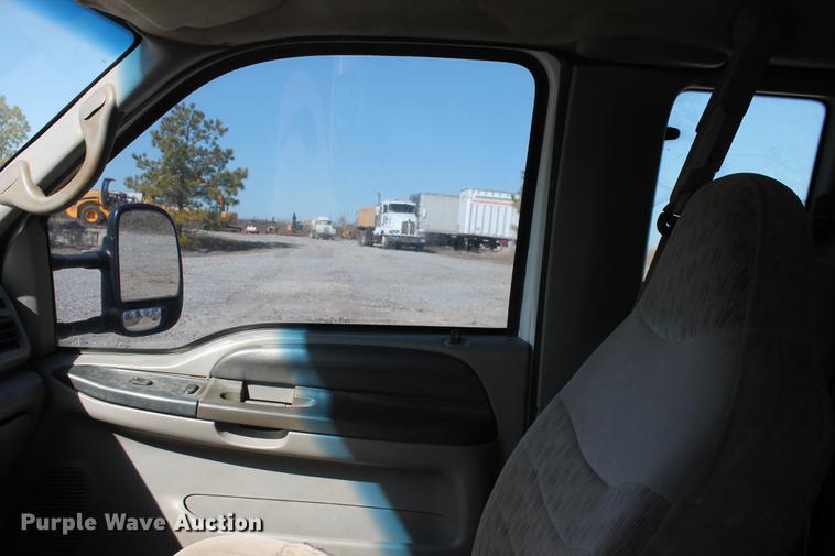 image for item DB5144 1999 Ford F350 Super Duty XLT SuperCab flatbed pickup truck