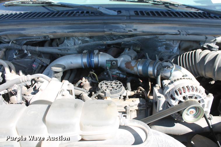 image for item DB5144 1999 Ford F350 Super Duty XLT SuperCab flatbed pickup truck