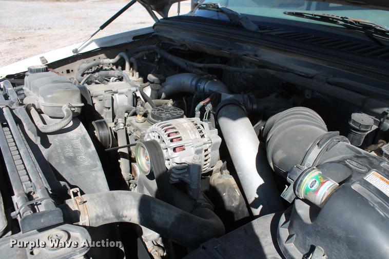 image for item DB5144 1999 Ford F350 Super Duty XLT SuperCab flatbed pickup truck