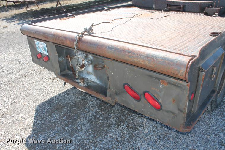 image for item DB5144 1999 Ford F350 Super Duty XLT SuperCab flatbed pickup truck