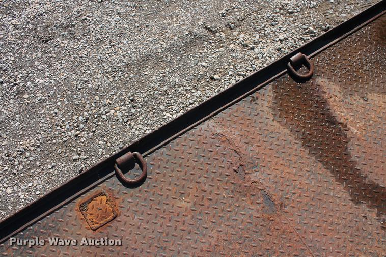 image for item DB5144 1999 Ford F350 Super Duty XLT SuperCab flatbed pickup truck