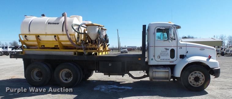 image for item DB7199 1997 Peterbilt 330 flatbed truck with mixing system