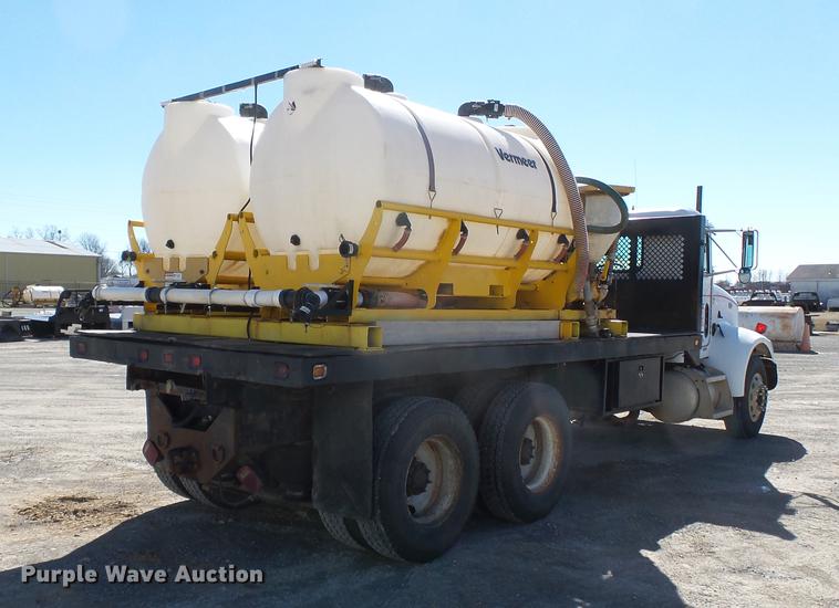 image for item DB7199 1997 Peterbilt 330 flatbed truck with mixing system