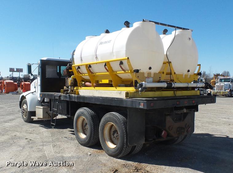 image for item DB7199 1997 Peterbilt 330 flatbed truck with mixing system