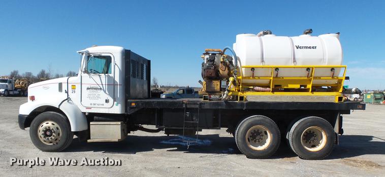image for item DB7199 1997 Peterbilt 330 flatbed truck with mixing system
