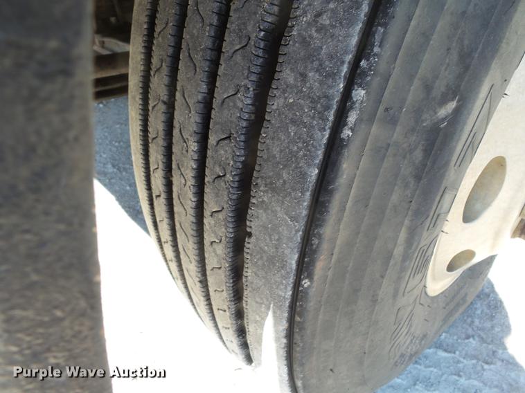 image for item DB7199 1997 Peterbilt 330 flatbed truck with mixing system