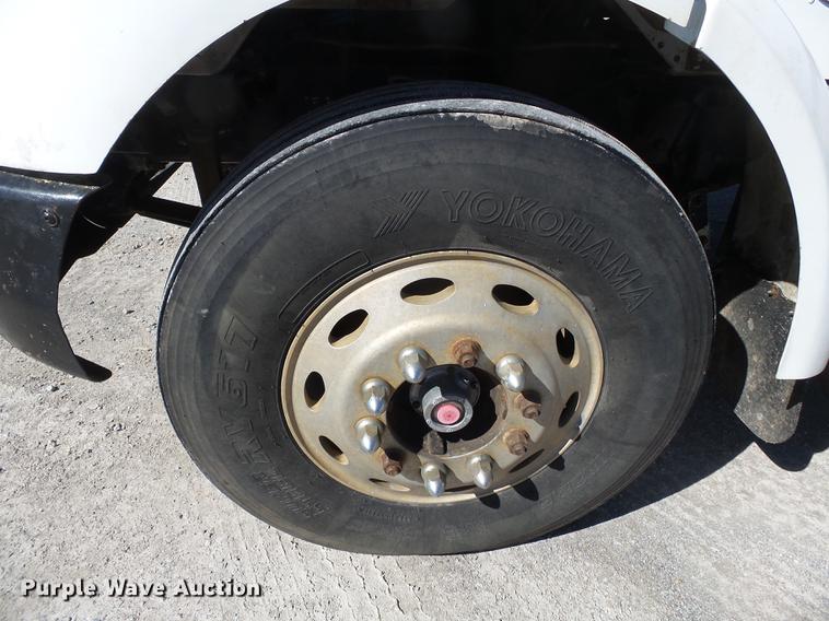 image for item DB7199 1997 Peterbilt 330 flatbed truck with mixing system