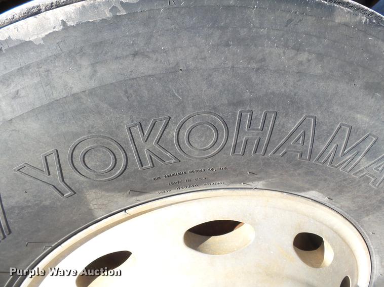 image for item DB7199 1997 Peterbilt 330 flatbed truck with mixing system