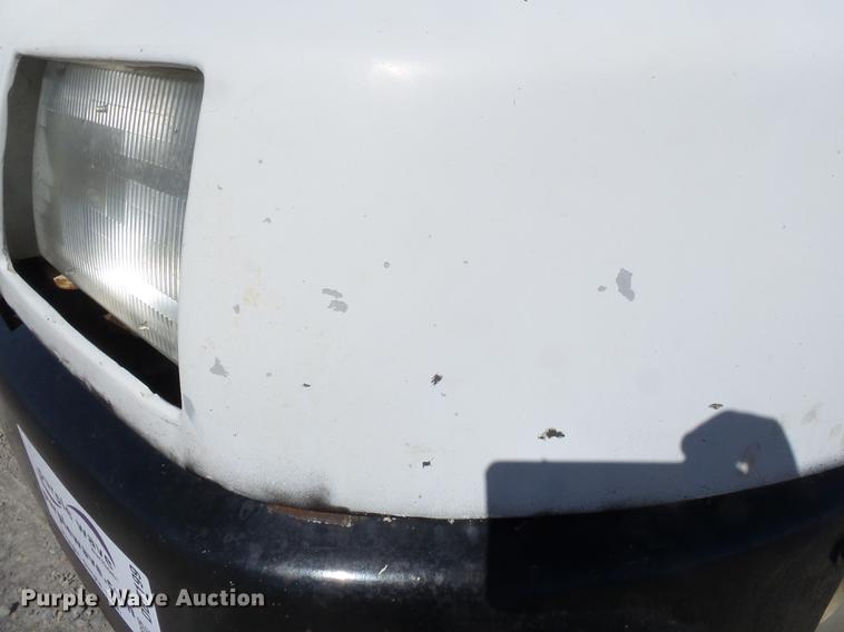 image for item DB7199 1997 Peterbilt 330 flatbed truck with mixing system