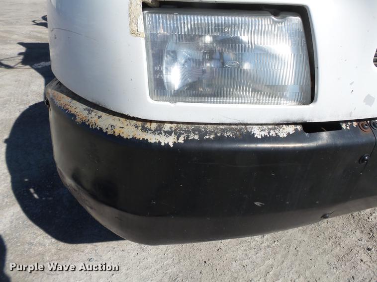 image for item DB7199 1997 Peterbilt 330 flatbed truck with mixing system