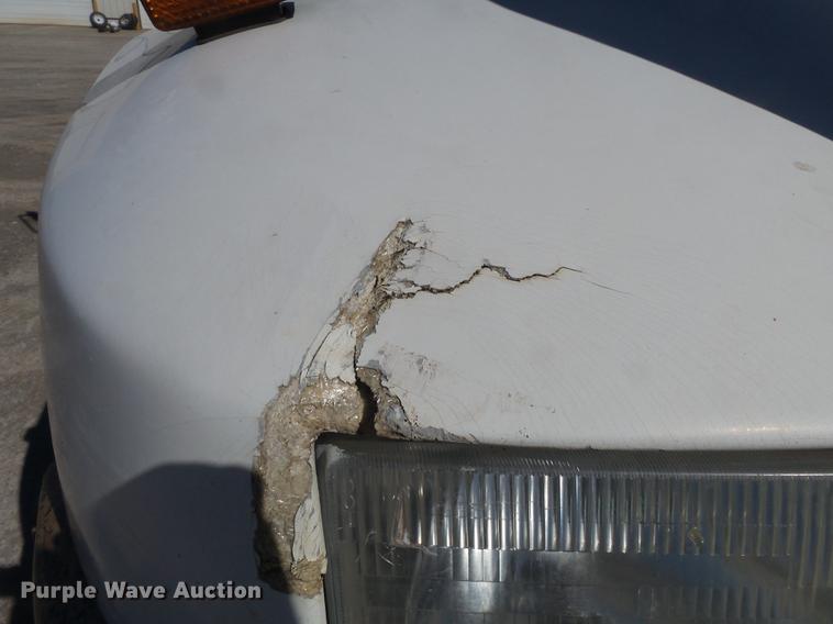 image for item DB7199 1997 Peterbilt 330 flatbed truck with mixing system