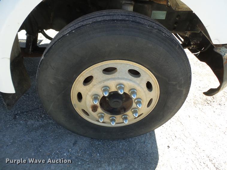 image for item DB7199 1997 Peterbilt 330 flatbed truck with mixing system