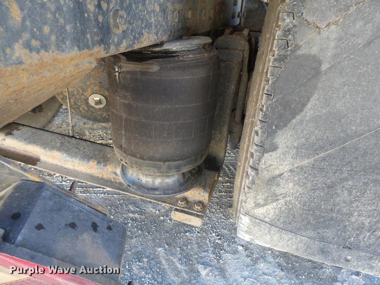 image for item DB7199 1997 Peterbilt 330 flatbed truck with mixing system