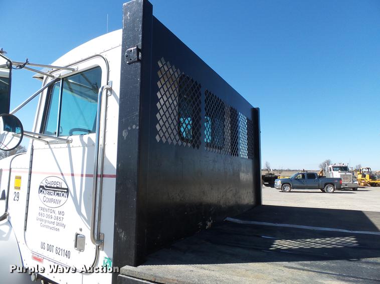 image for item DB7199 1997 Peterbilt 330 flatbed truck with mixing system