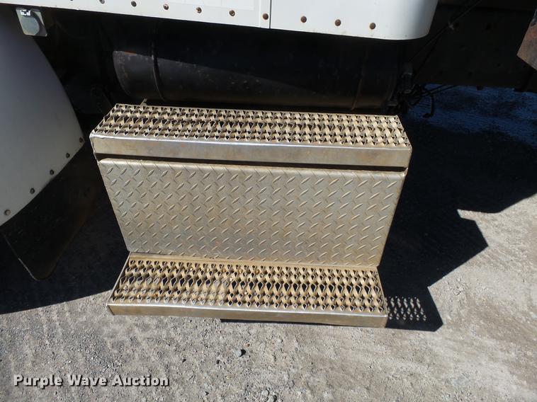 image for item DB7199 1997 Peterbilt 330 flatbed truck with mixing system