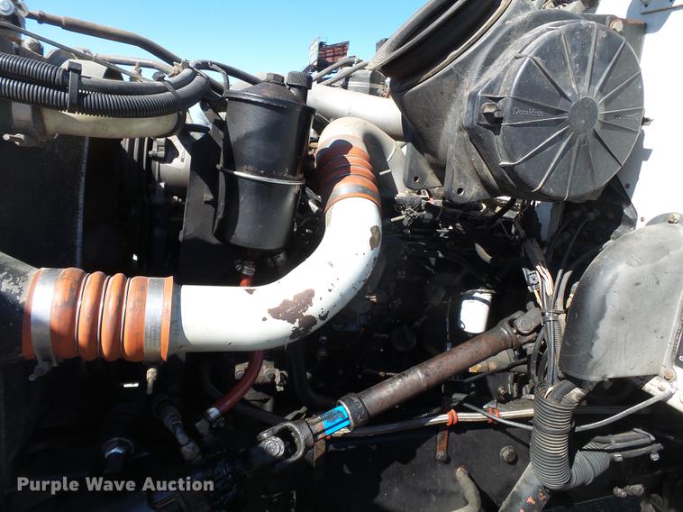 image for item DB7199 1997 Peterbilt 330 flatbed truck with mixing system