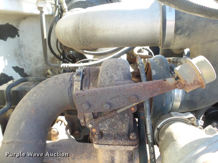 image for item DB7199 1997 Peterbilt 330 flatbed truck with mixing system