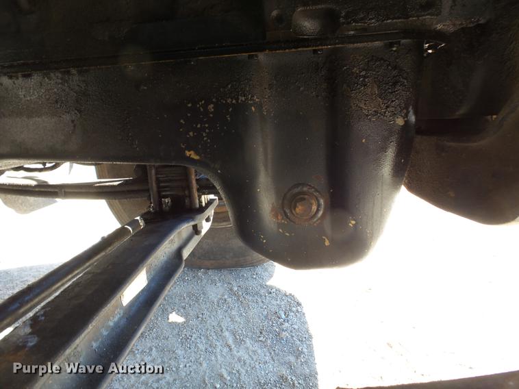 image for item DB7199 1997 Peterbilt 330 flatbed truck with mixing system