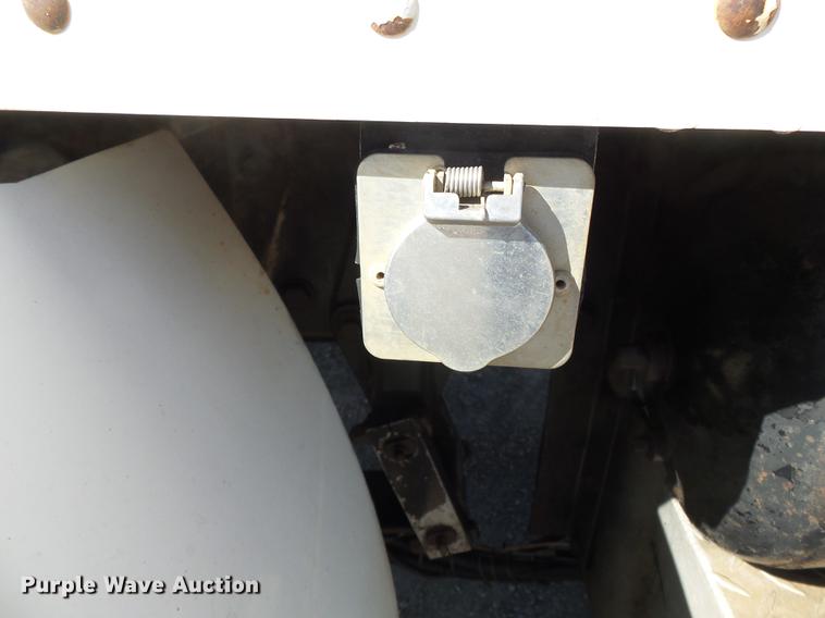 image for item DB7199 1997 Peterbilt 330 flatbed truck with mixing system