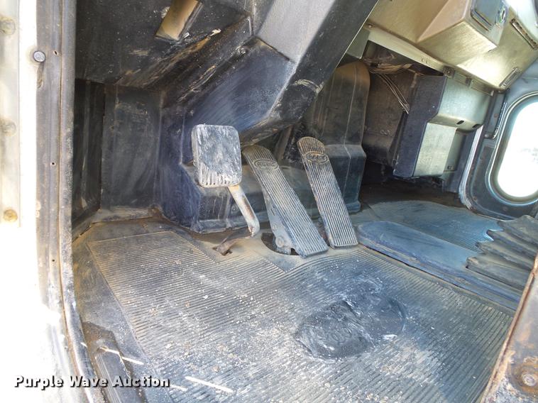 image for item DB7199 1997 Peterbilt 330 flatbed truck with mixing system