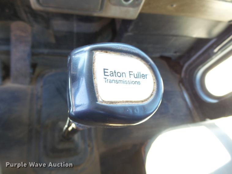 image for item DB7199 1997 Peterbilt 330 flatbed truck with mixing system