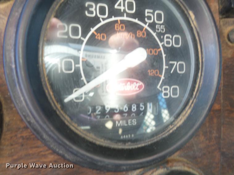 image for item DB7199 1997 Peterbilt 330 flatbed truck with mixing system