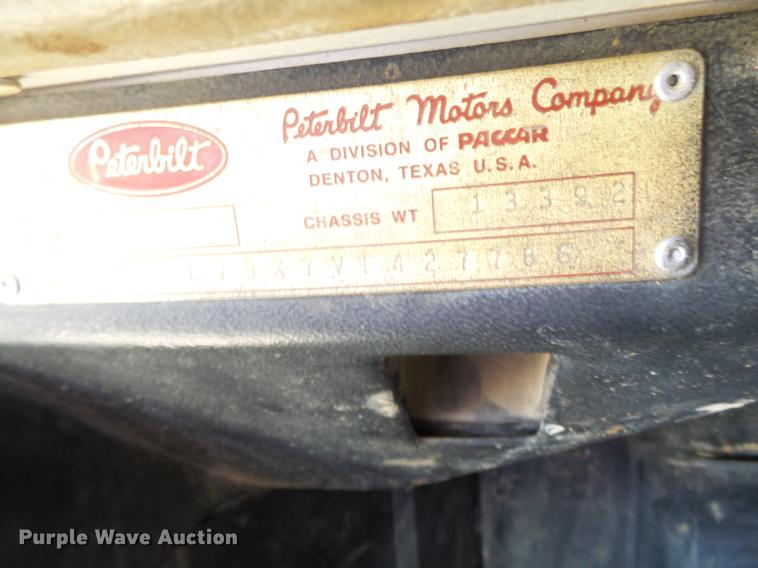 image for item DB7199 1997 Peterbilt 330 flatbed truck with mixing system