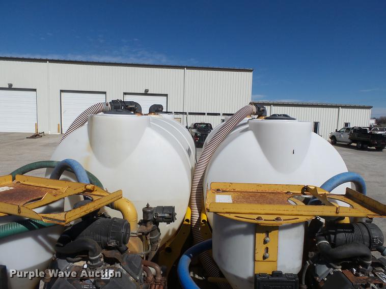 image for item DB7199 1997 Peterbilt 330 flatbed truck with mixing system