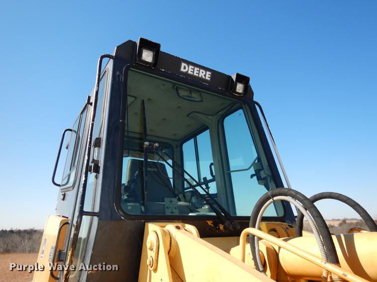 image for item DC0338 2000 John Deere 655C track loader