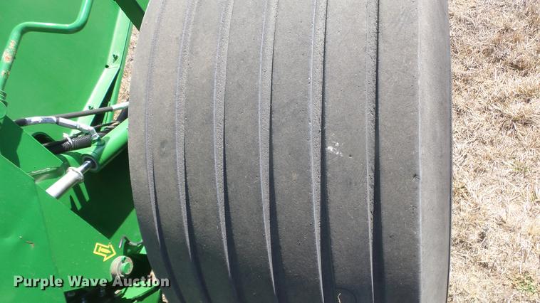 image for item DC0712 2014 John Deere 469 round baler