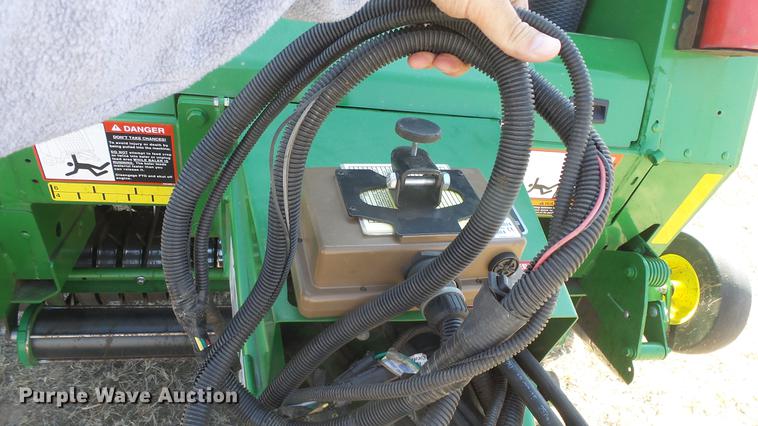 image for item DC0712 2014 John Deere 469 round baler