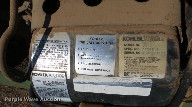 image for item DC0736 John Deere 112 lawn mower