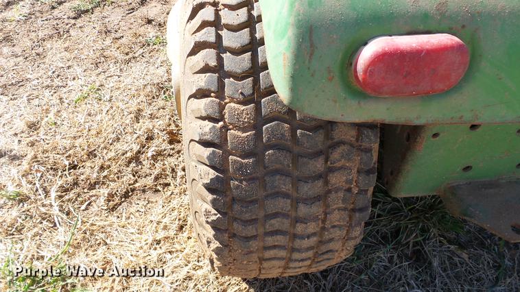 image for item DC0736 John Deere 112 lawn mower