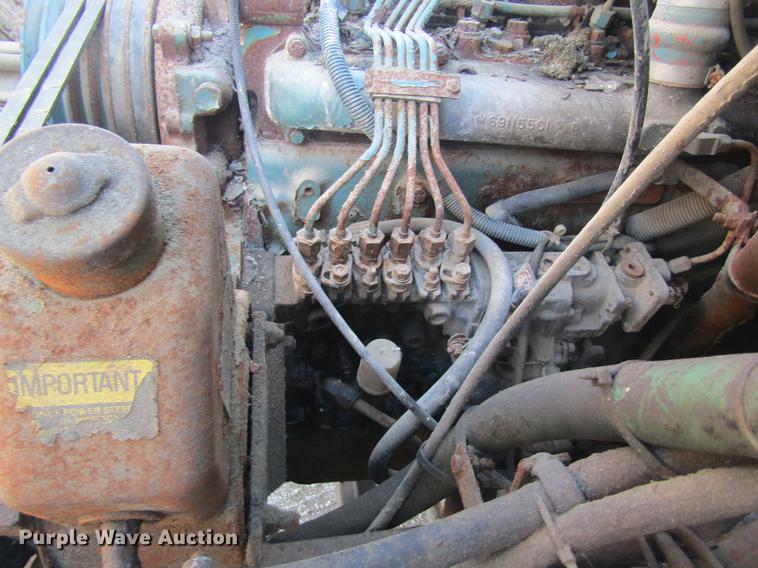 image for item DC4407 1985 International 1954 feed mixer truck