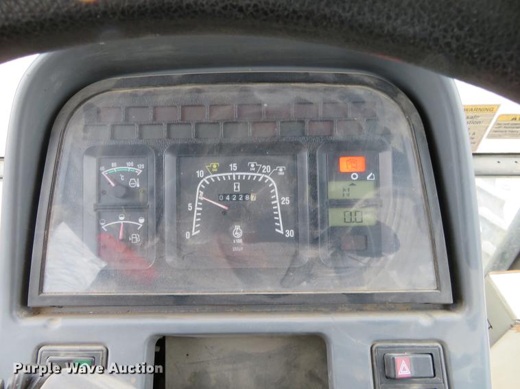 image for item DC0902 2000 New Holland TS110 MFWD tractor