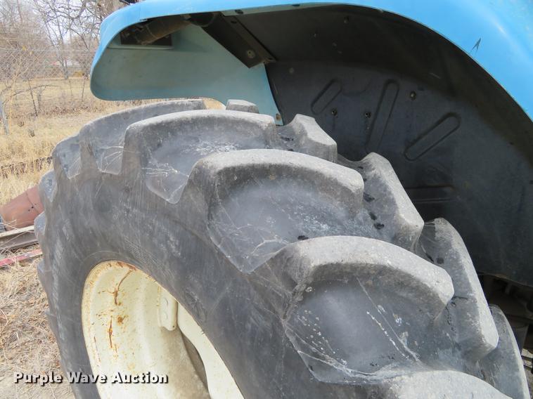 image for item DC0902 2000 New Holland TS110 MFWD tractor