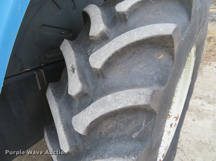 image for item DC0902 2000 New Holland TS110 MFWD tractor