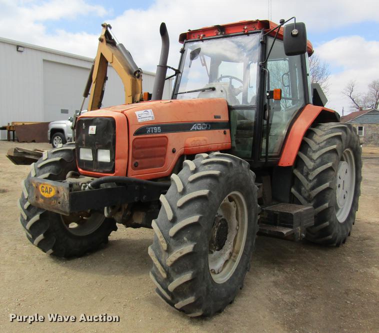 image for item DC4427 AGCO RT95 MFWD tractor with side boom mower