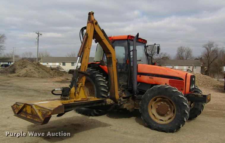 image for item DC4427 AGCO RT95 MFWD tractor with side boom mower